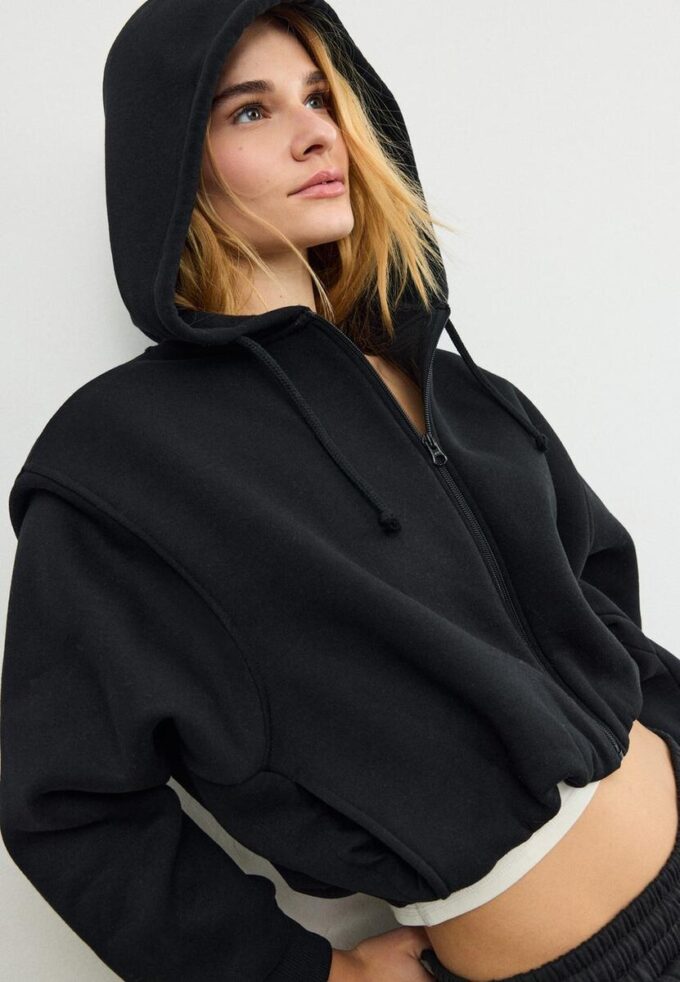 Mønstret bomber-sweatshirt med hette og trykk