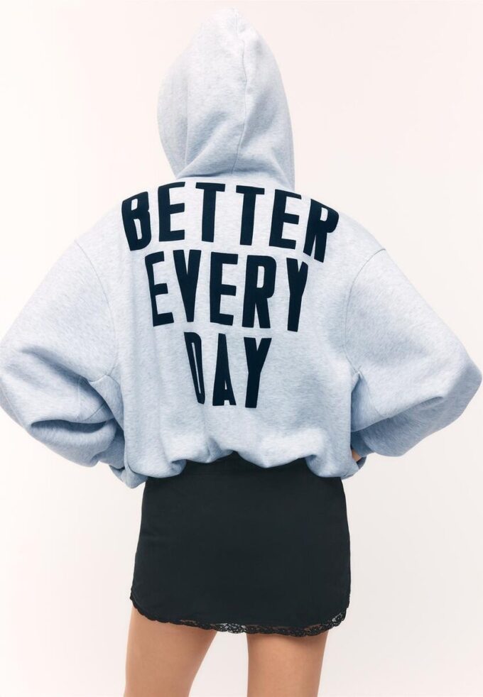 Mønstret bomber-sweatshirt med hette og trykk