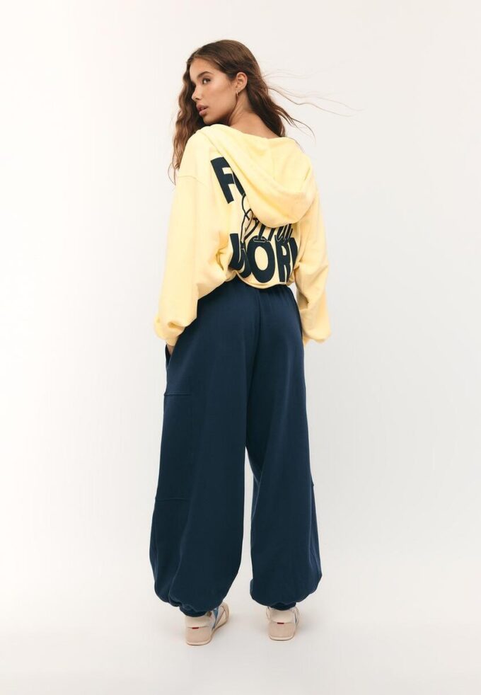 Mønstret bomber-sweatshirt med hette og trykk