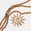 Perlehalskjede med solmotiv