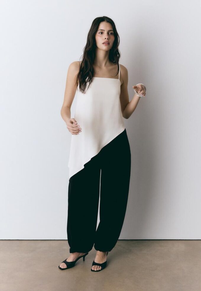 Satin-topper med asymmetrisk kant