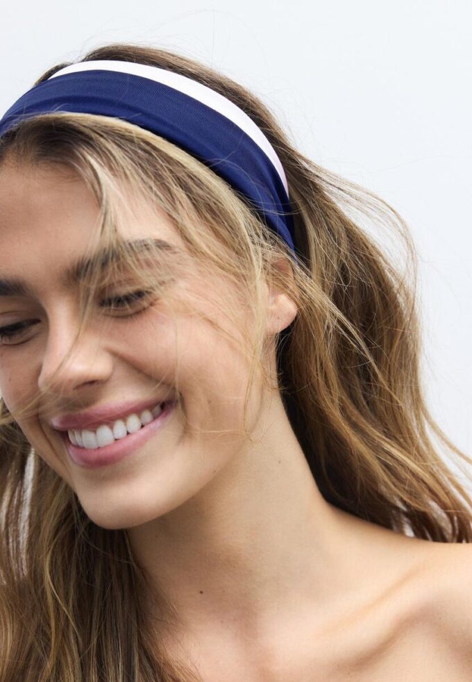 Sett med 2 elastiske hårbånd i pels