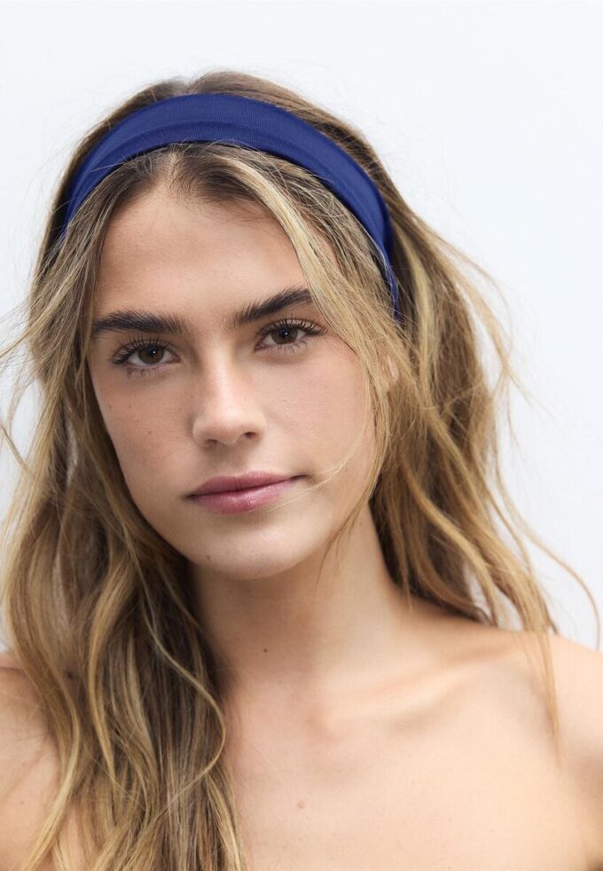 Sett med 2 elastiske hårbånd i pels