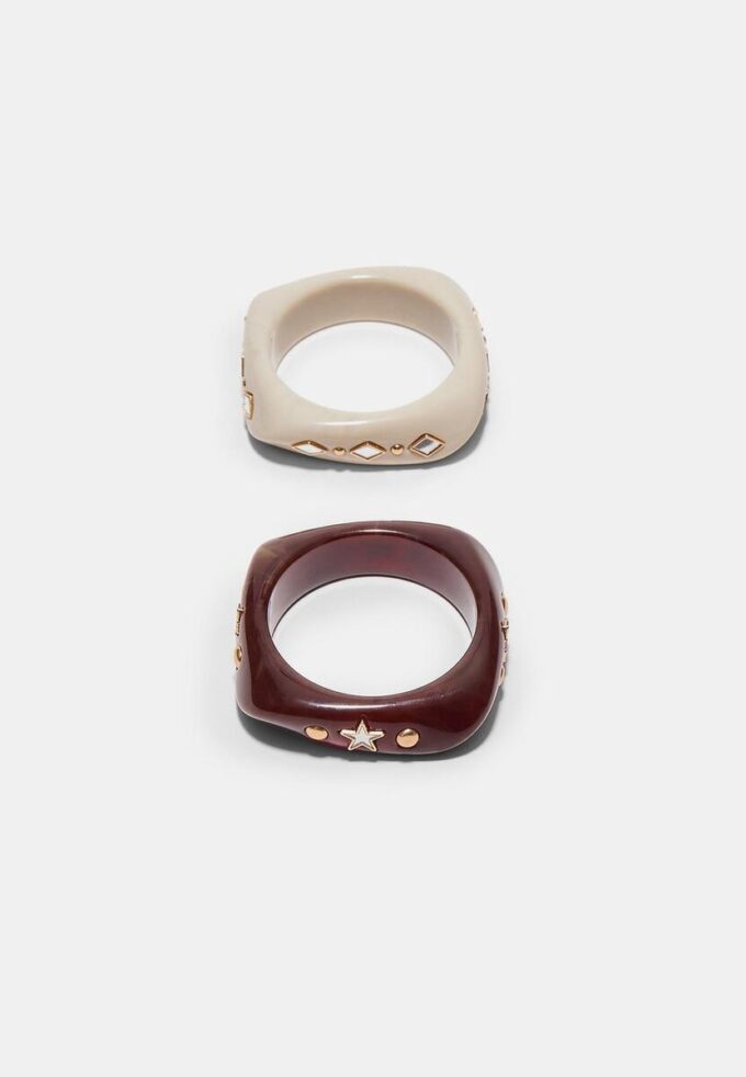 Sett med 2 stjerne- og glitrende armbånd