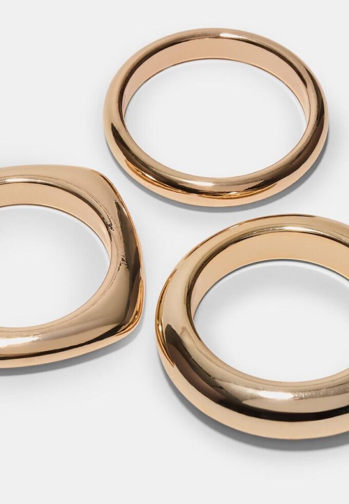 Sett med 3 stive armbånd