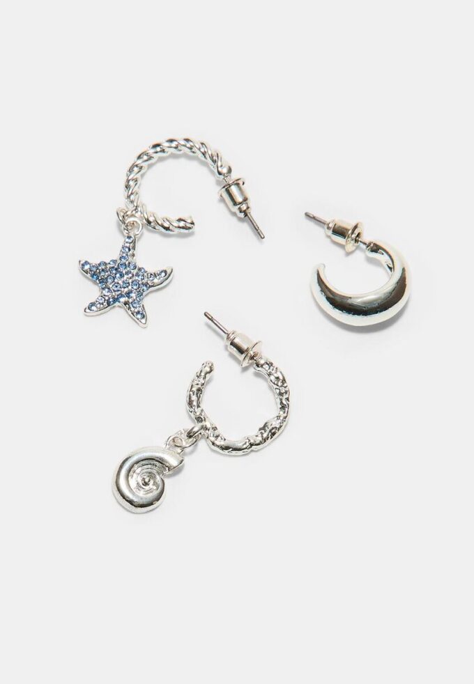 Sett med 9 øreringer med rhinestones og sjøstjerner