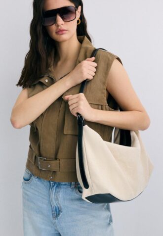 Skulderveske i kontrastfarget lerret