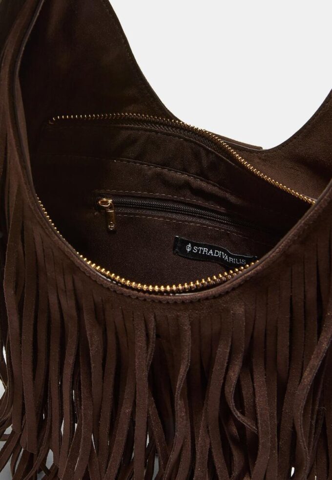 Skulderveske med frynser og spenne