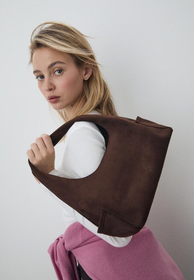 Skulderveske med lommer