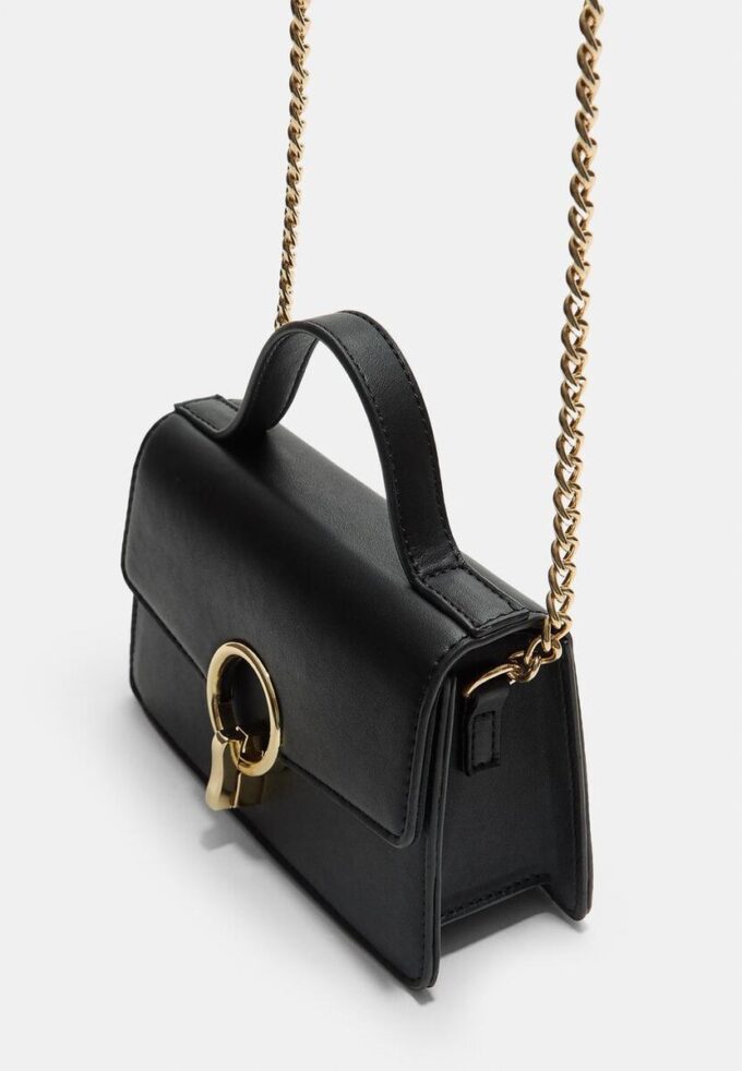 Skulderveske med rund lås