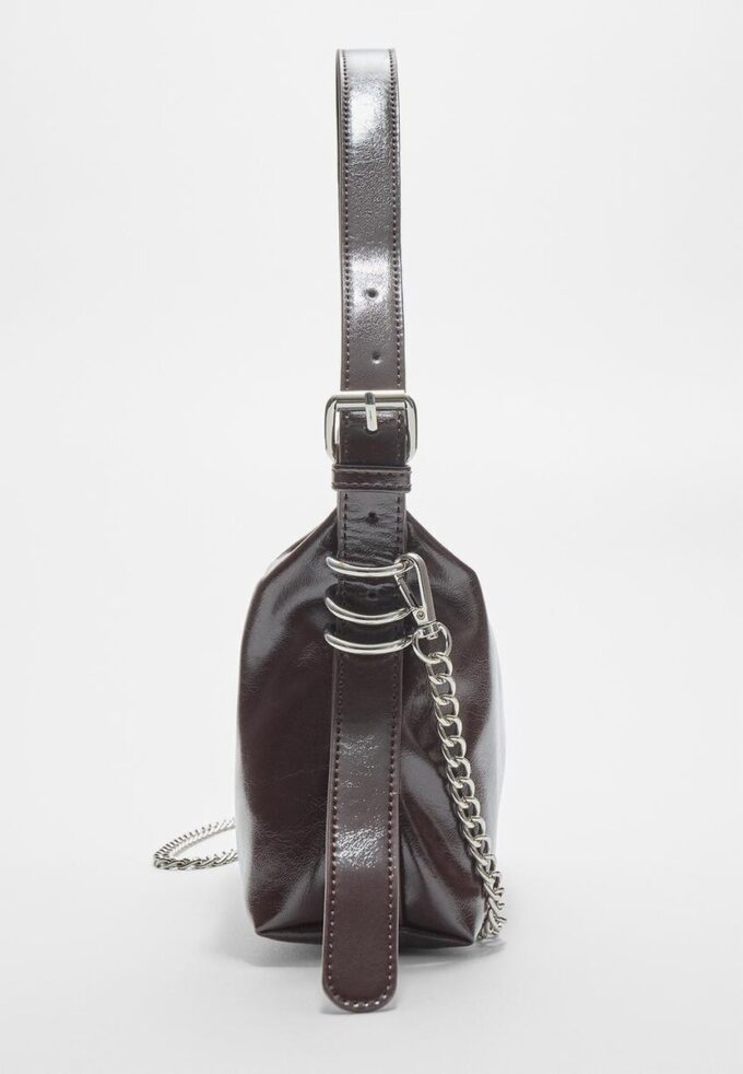 Skulderveske med stroppdetaljer