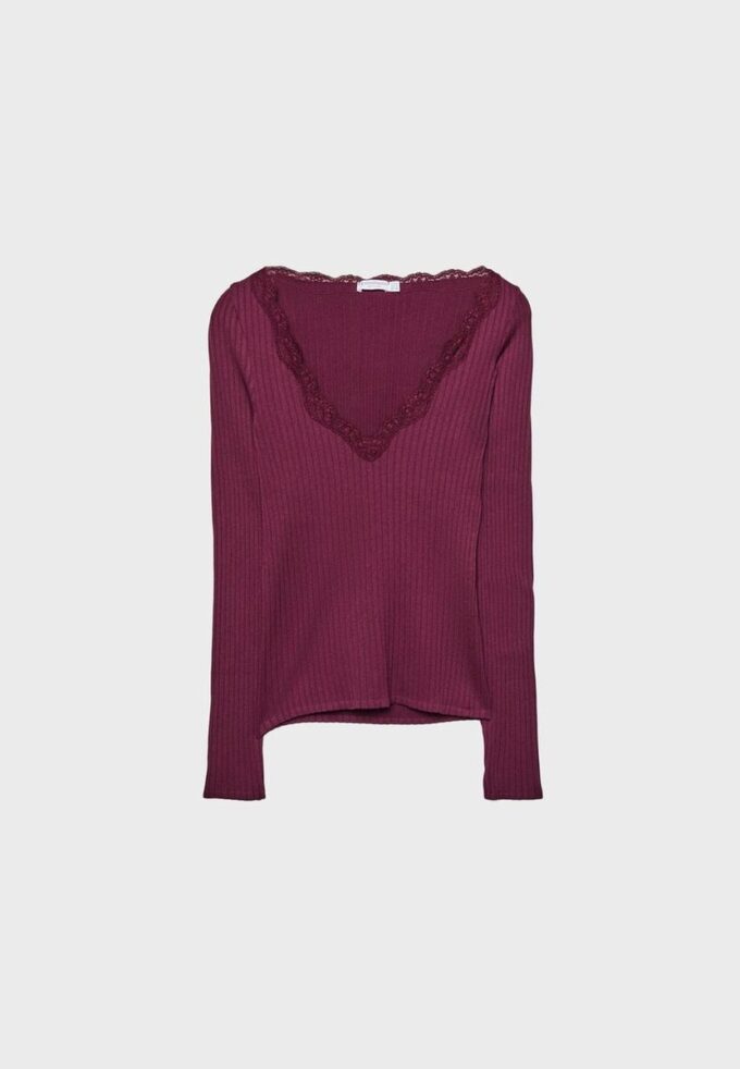 Sømløs bluse i blonder