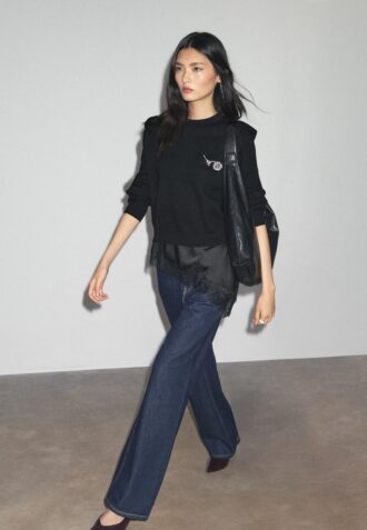 Strikket genser med polstrede skuldre