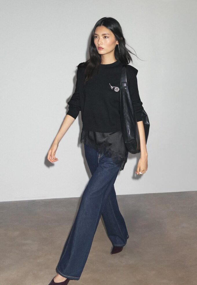 Strikket genser med polstrede skuldre