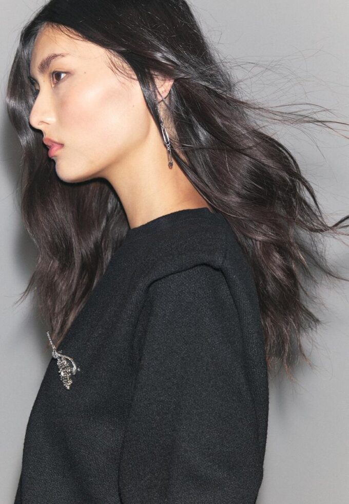 Strikket genser med polstrede skuldre