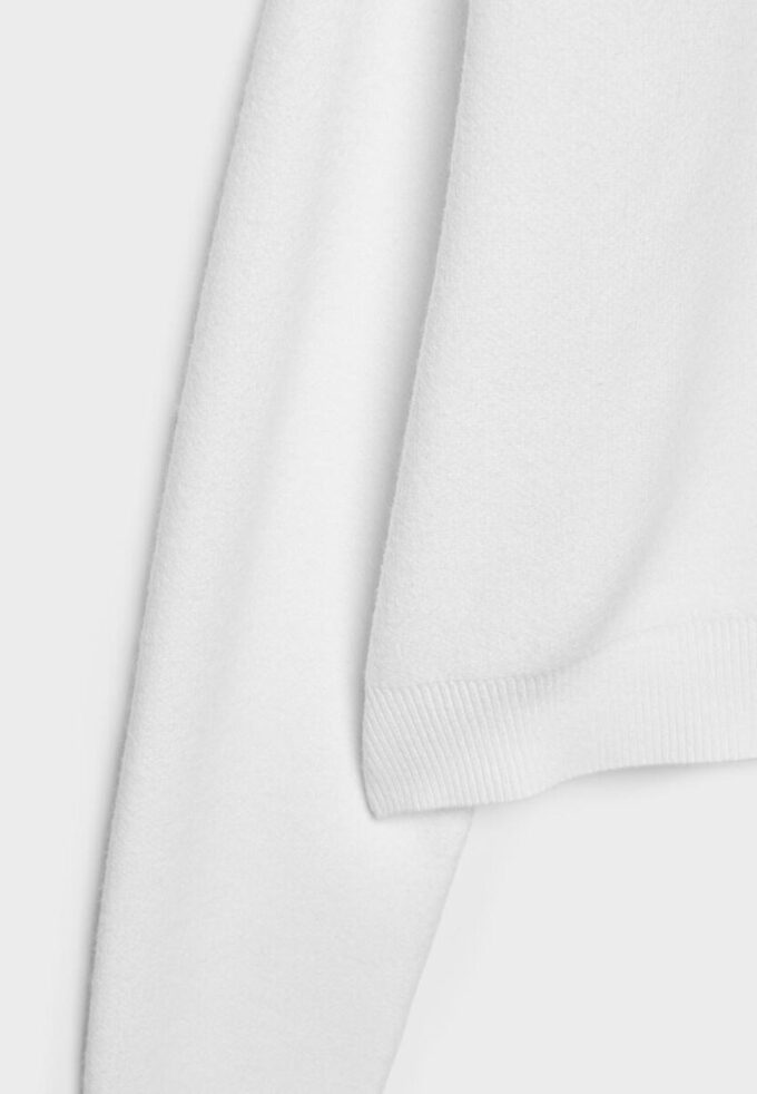 Strikket genser med polstrede skuldre