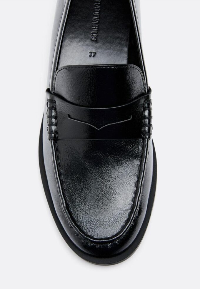 Svarte loafers i skinnimitasjon
