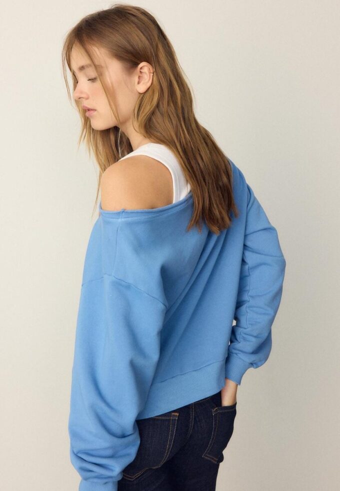 Sweatshirt med båthals og vinger med rhinestones