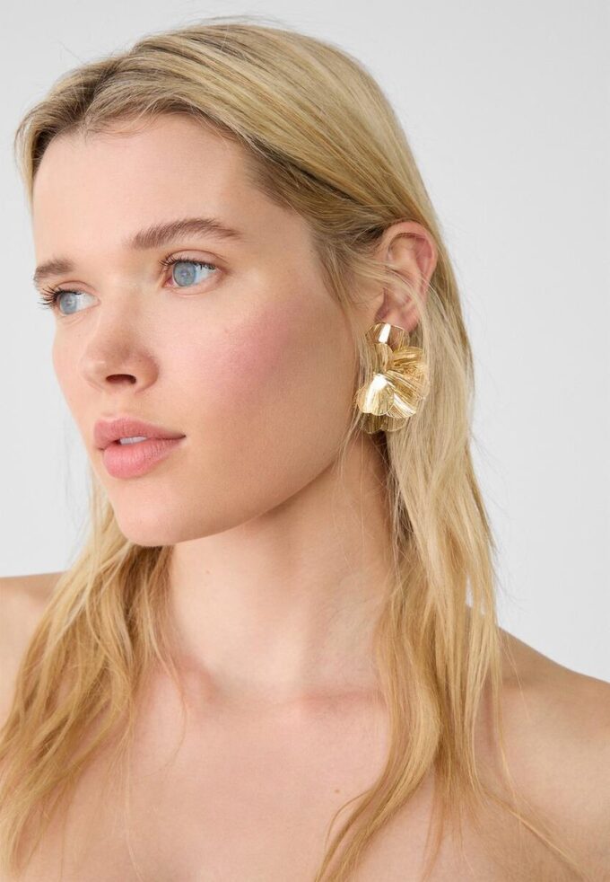 Teksturerte blomstervifteøreringer