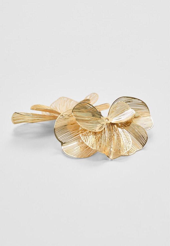 Teksturerte blomstervifteøreringer