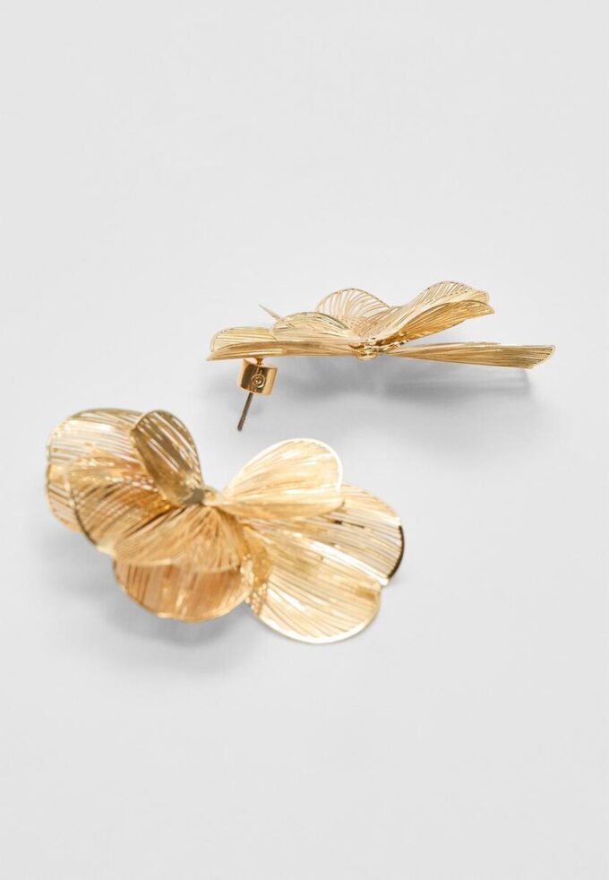 Teksturerte blomstervifteøreringer