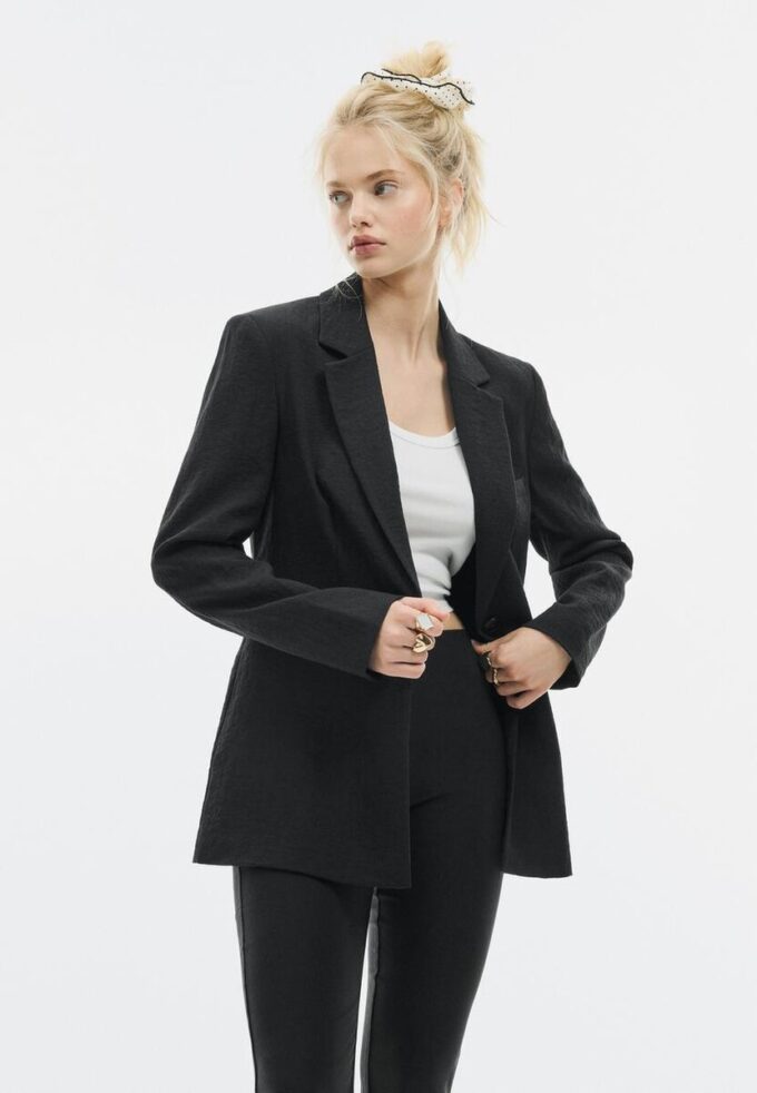 Tettsittende rustikk blazer