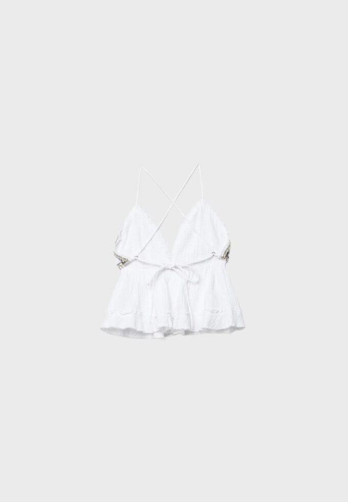 Top med volanger og perler