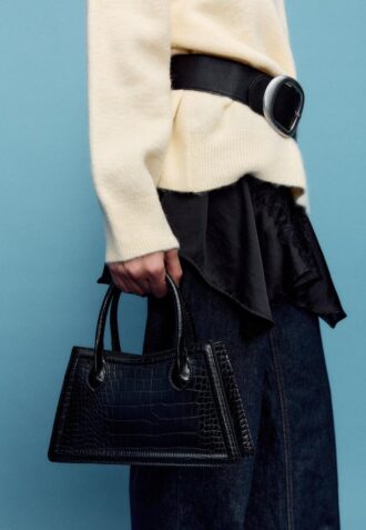 Trapesformet skulderveske med kokosnøtteffekt