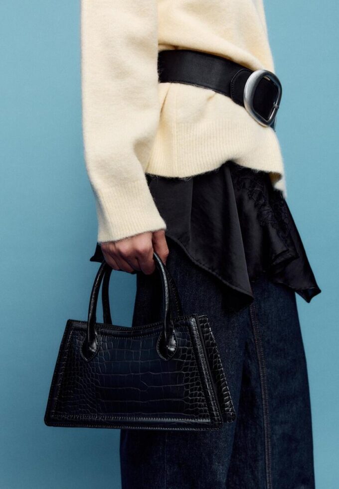 Trapesformet skulderveske med kokosnøtteffekt