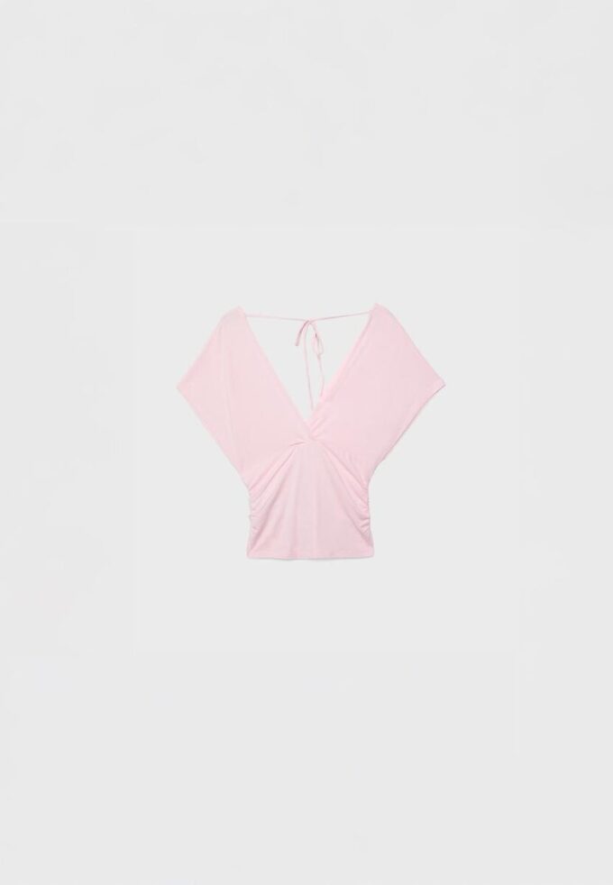 V-hals-topper med bånd