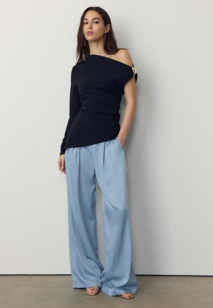 Velløpende bukser med krøll-effekt og snøring