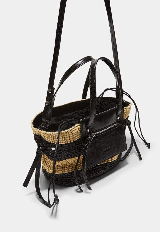 Veske med kurv-effekt