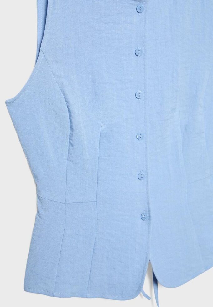 Vest med knapper