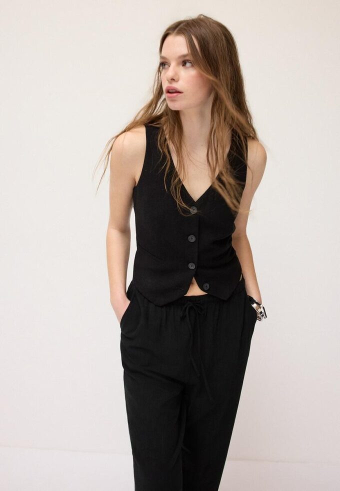 Vest med knapper i lin-effekt