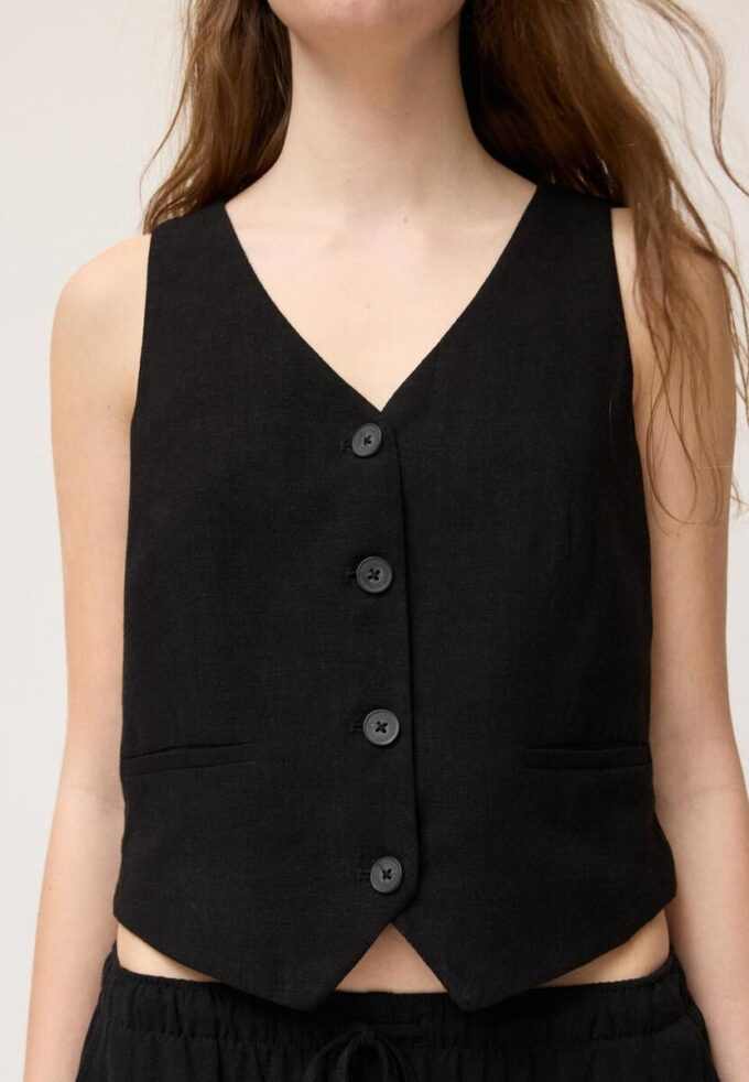 Vest med knapper i lin-effekt